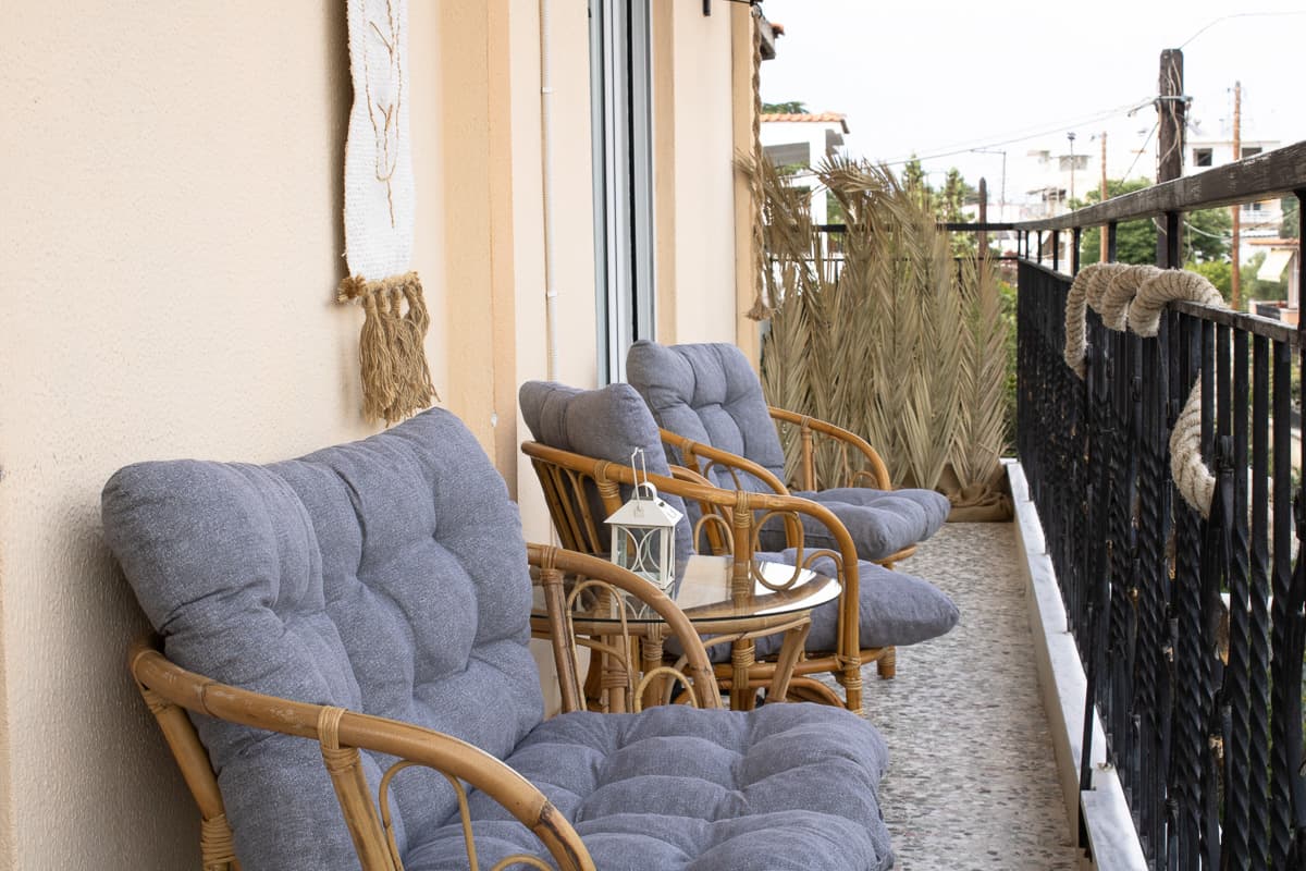 Sunny balcony with seating in Kavala apartment near Thasos