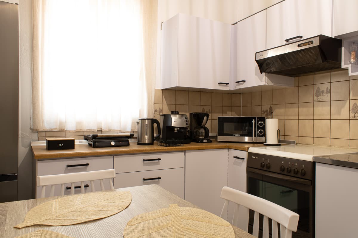 Modern fully equipped kitchen in Kavala boho apartment
